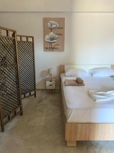 Postel nebo postele na pokoji v ubytování Villa Spartandom