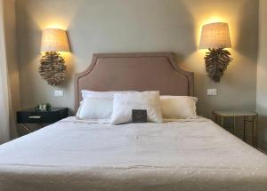 Voodi või voodid majutusasutuse Gian Paul Hotel toas