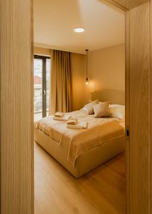 Postel nebo postele na pokoji v ubytování Monic Apart + 62 fotografií