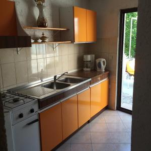 Apartment Ivanka tesisinde mutfak veya mini mutfak