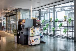 a vending machine in the middle of a building at Scandic Simonkenttä in Helsinki