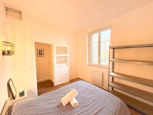Katil atau katil-katil dalam bilik di Le Lavoisier - Appartement spacieux - Esprit loft