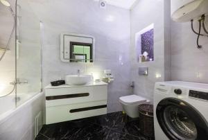 Koupelna v ubytování Nyvky Like Home - Nyvky Park Lux 149 + 17 fotografií