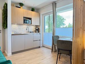 Η κουζίνα ή μικρή κουζίνα στο Apartment Meerflair mit Balkon