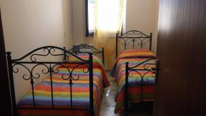 A bed or beds in a room at Casa Josephine