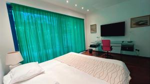 TV/trung tâm giải trí tại Domus Hotel