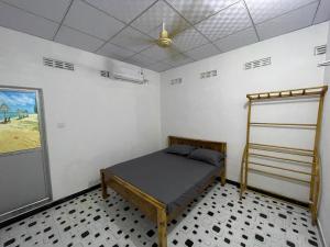 Tempat tidur dalam kamar di Silva Hostel & Rooms