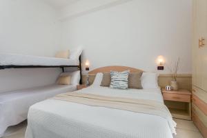 Postel nebo postele na pokoji v ubytování Hotel Teti