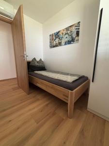 Postel nebo postele na pokoji v ubytování Resort Winklfeld 6a