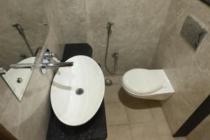 Koupelna v ubytování Manan Homestay