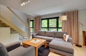 Część wypoczynkowa w obiekcie Ekskluzywny Apartament Sun Seasons 24 w Karpaczu by Noclegi Renters