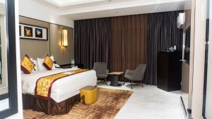 Katil atau katil-katil dalam bilik di GreenPoint Hotel