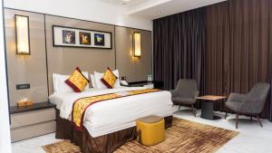 Katil atau katil-katil dalam bilik di GreenPoint Hotel