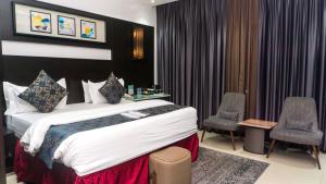 Katil atau katil-katil dalam bilik di GreenPoint Hotel