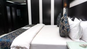 Katil atau katil-katil dalam bilik di GreenPoint Hotel
