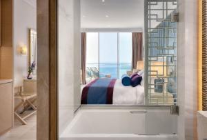 Letto o letti in una camera di Amavi, MadeForTwo Hotels - Paphos