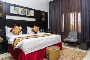 Katil atau katil-katil dalam bilik di GreenPoint Hotel