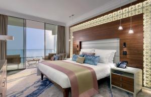Letto o letti in una camera di Amavi, MadeForTwo Hotels - Paphos
