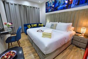 Postel nebo postele na pokoji v ubytování Hotel Dar Annasr