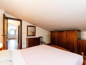 Posteľ alebo postele v izbe v ubytovaní Apartment La Colombera E by Interhome