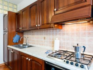 A kitchen or kitchenette at Apartment La Colombera-2 by Interhome