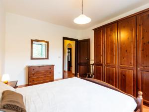 A bed or beds in a room at Apartment La Colombera-2 by Interhome