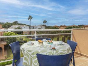 A balcony or terrace at Apartment Port Pals EIII by Interhome