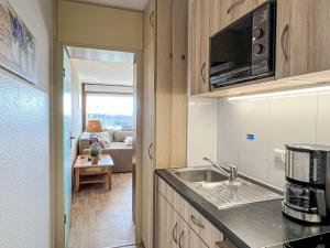 Kuchyň nebo kuchyňský kout v ubytování Apartment Bergliebe - G 103 by Interhome