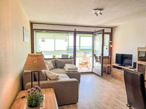 TV a/nebo společenská místnost v ubytování Apartment Bergliebe - G 103 by Interhome