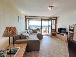 TV a/nebo společenská místnost v ubytování Apartment Bergliebe - G 103 by Interhome