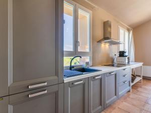Kuchyňa alebo kuchynka v ubytovaní Holiday Home Il Fienile by Interhome
