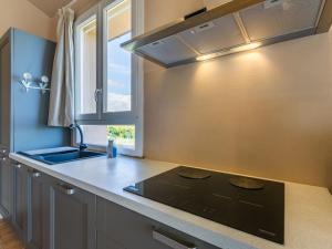 Kuchyňa alebo kuchynka v ubytovaní Holiday Home Il Fienile by Interhome