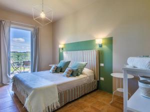 Posteľ alebo postele v izbe v ubytovaní Holiday Home Il Fienile by Interhome