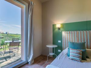Posteľ alebo postele v izbe v ubytovaní Holiday Home Il Fienile by Interhome