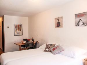 Postel nebo postele na pokoji v ubytování Apartment Haus Bellevue-6 by Interhome
