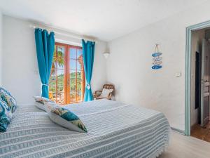 Łóżko lub łóżka w pokoju w obiekcie Villa Villa Etoile Filante by Interhome