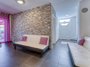 Postel nebo postele na pokoji v ubytování Holiday Home Radmila by Interhome