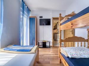Postel nebo postele na pokoji v ubytování Holiday Home Radmila by Interhome