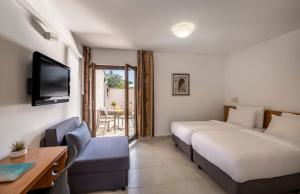 Postel nebo postele na pokoji v ubytování Maistra Select Villas Rubin Resort