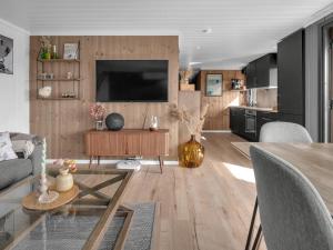 TV a/nebo společenská místnost v ubytování Chalet Kosetoppen by Interhome