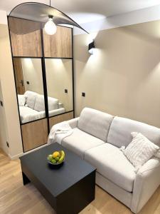 Кровать или кровати в номере Studio Californien à deux pas de la plage