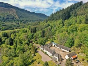 an aerial view of a house in the middle of a mountain at Holiday Home The Granary by Interhome in Invermoriston