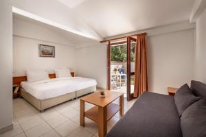 Postel nebo postele na pokoji v ubytování Maistra Select Villas Rubin Resort