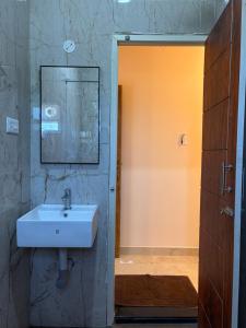 Koupelna v ubytování Hotel Saesha International