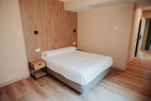Postel nebo postele na pokoji v ubytování Polotel