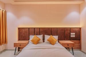 Hotel Beverly Palace Kozhikode - Hotel and Restaurant客房内的一张或多张床位