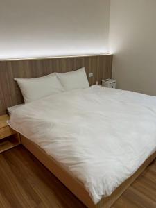 Postel nebo postele na pokoji v ubytování Yunshanjian B&B