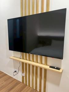 TV a/nebo společenská místnost v ubytování Yunshanjian B&B