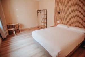 Postel nebo postele na pokoji v ubytování Polotel