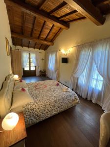 a bedroom with a bed and a couch at Casale Antica Cassia Beauty Spa in Rome +31 photos